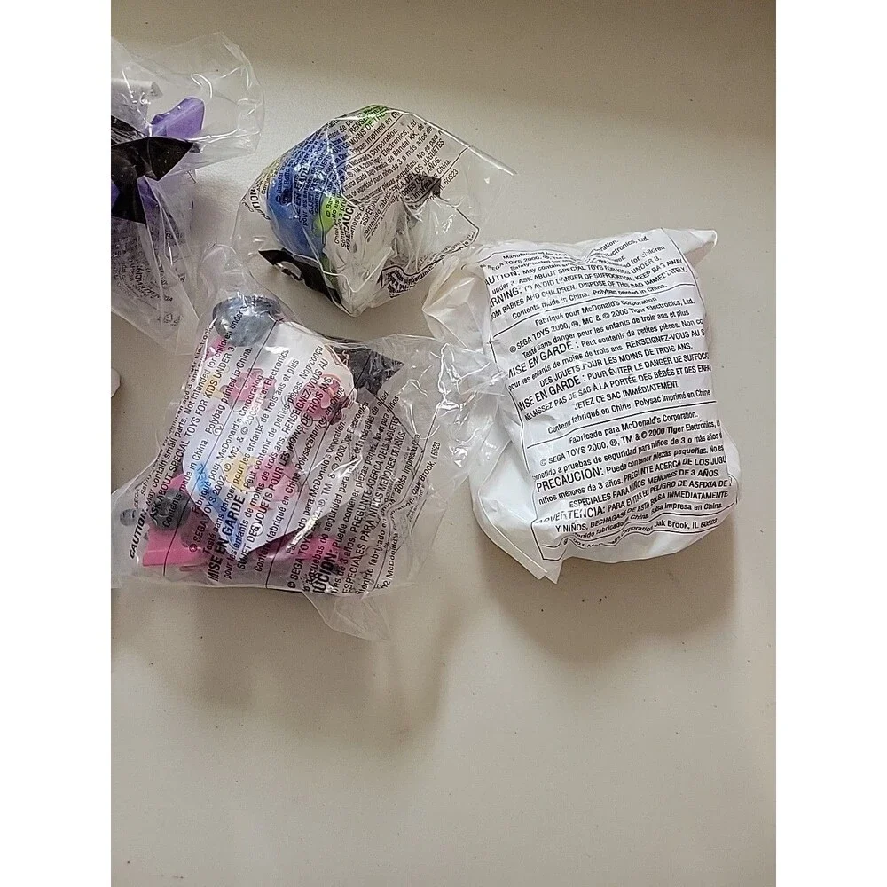 McDonald’s‎ Happy Meal Sega Robo Chi pet  Poo Dino meow Teddy mixed lot